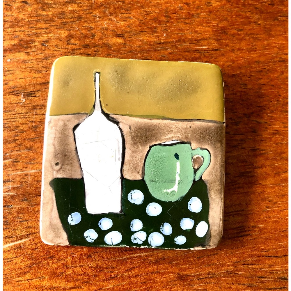 Painting of a Bottle and Cup on a Ceramic Brooch Pin